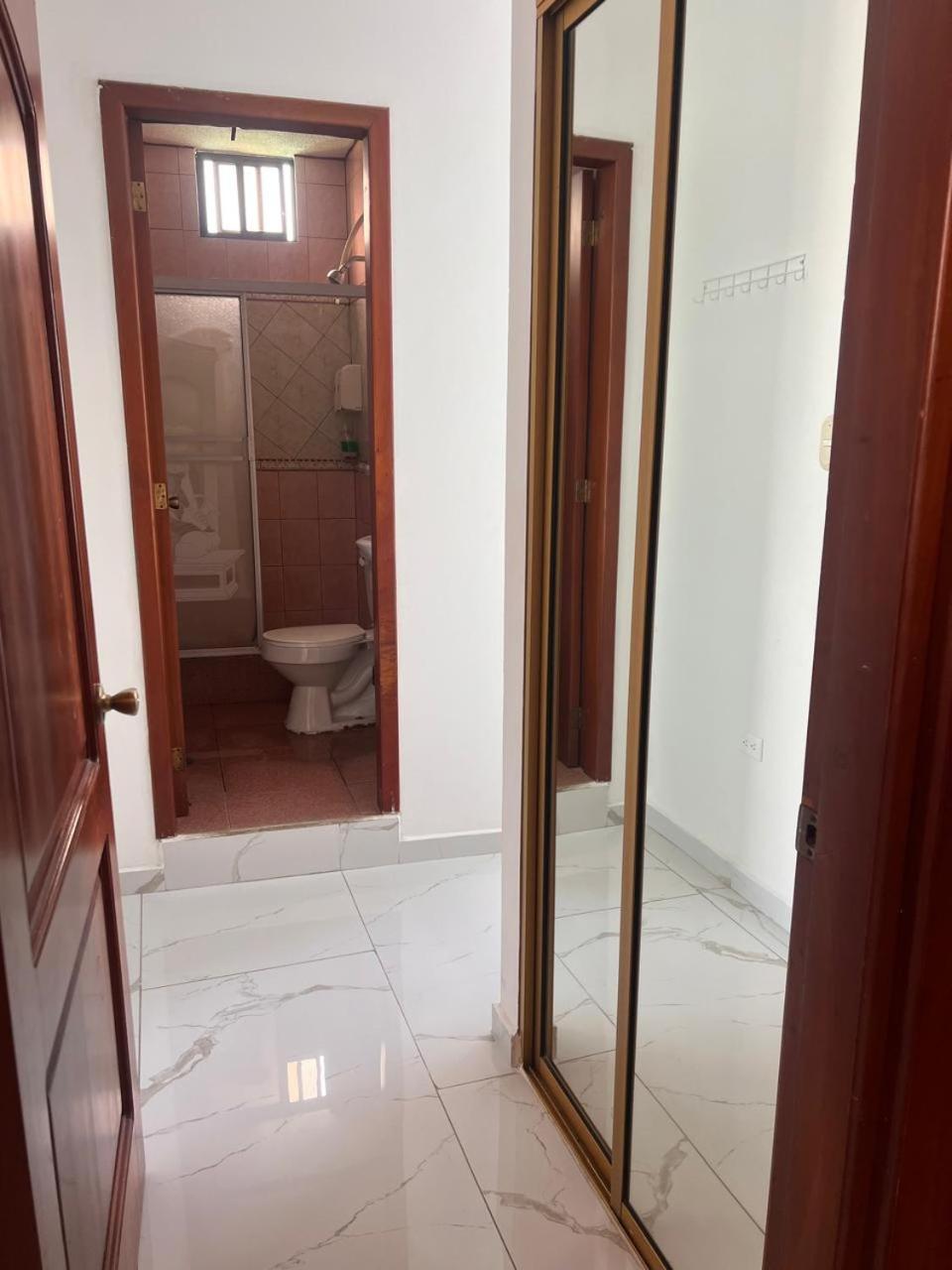 Hostal Carliza Пуэрто-Айора Экстерьер фото