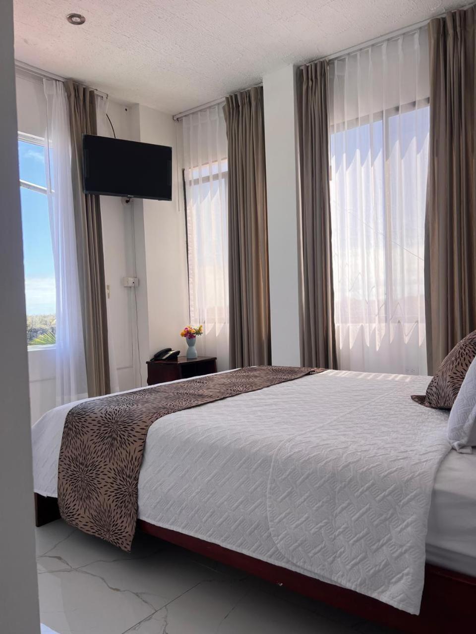 Hostal Carliza Пуэрто-Айора Экстерьер фото